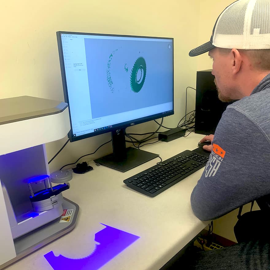 Product engineers reviewing a CAD drawing of how the Trika rod is built