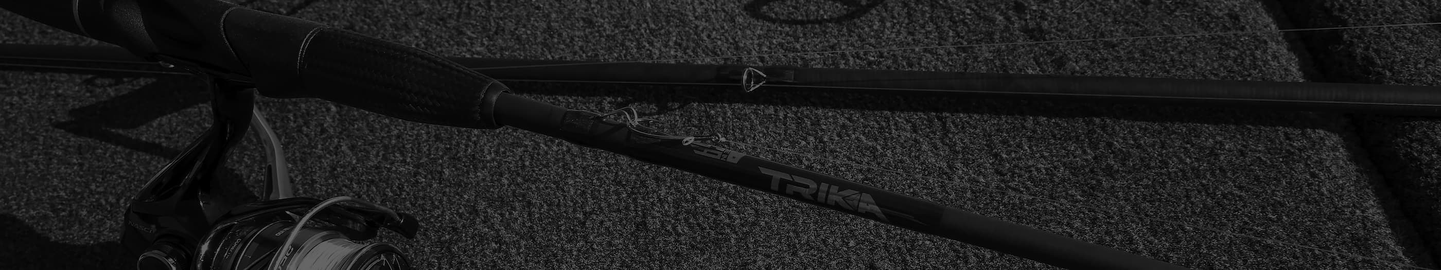 Close up of a Trika fishing rod that shows the carbon material and Kigan guides