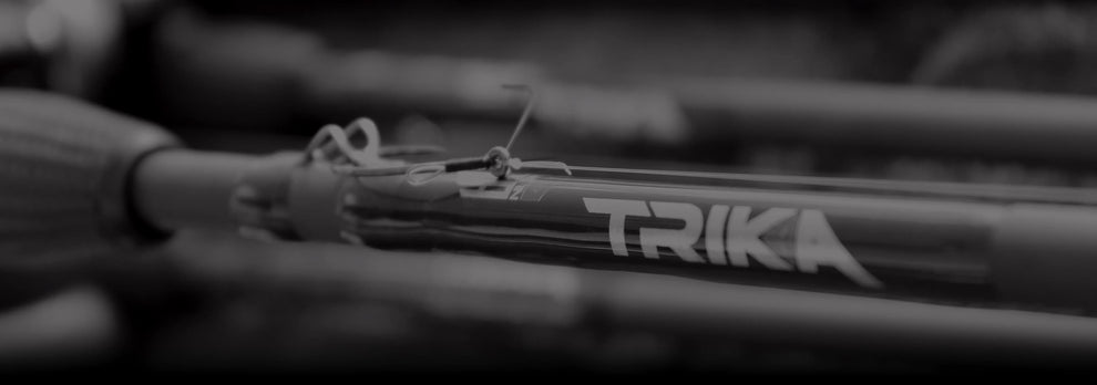 Close up of the line on the Trika fishing rod featuring the Trika logo